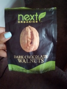 Organic walnuts covered with organic dark chocolate